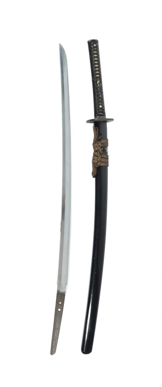 A Japanese sword (katana), blade 28 in., hon-zukiri, hamon based on suguha, signed (Omi no kami