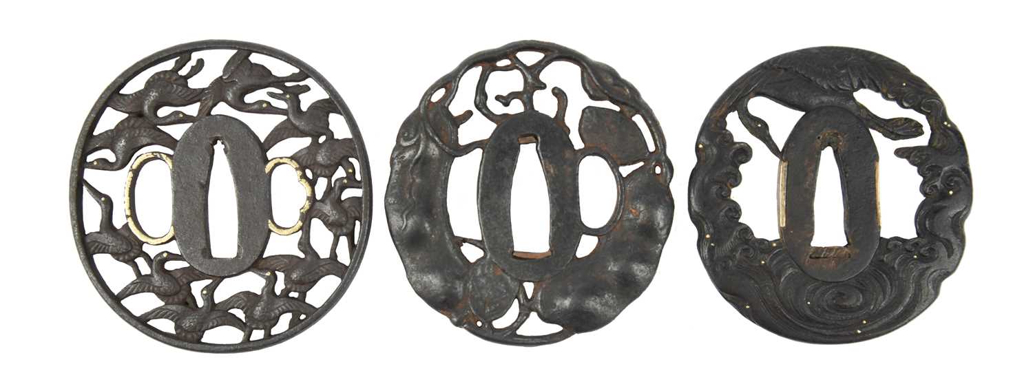 A collection of Japanese sword fittings, comprising: Three Japanese iron sword guards (tsuba), - Image 10 of 15