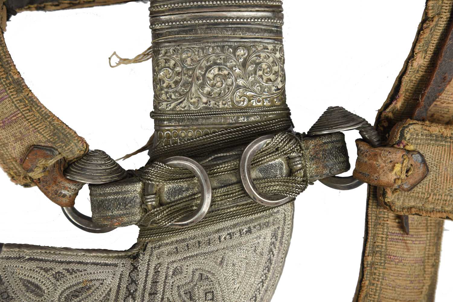 λ An Omani dagger (jambiya), broad curved blade 6.5 in. rhinoceros horn hilt with embossed silver - Image 2 of 3