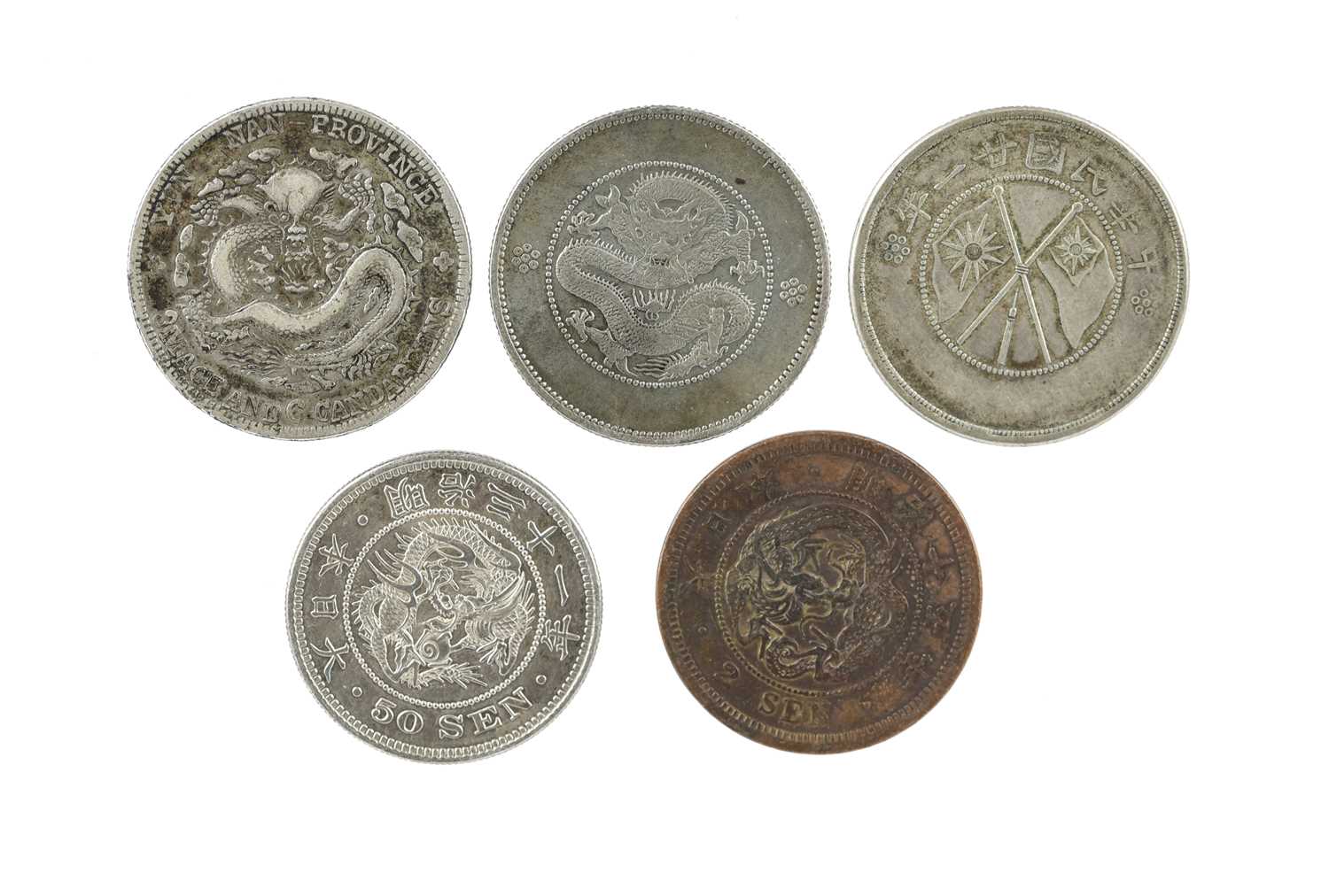 A small quantity of Asian coins, comprising: China - Empire, Yunnan, Guangxu, fifty cents,