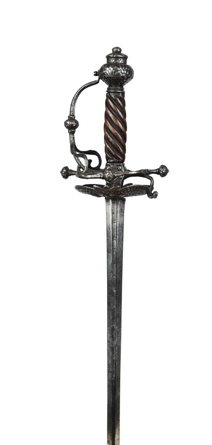 A 17th century English rapier, slender blade 38 in., a short fuller to each side inscribed 'ON