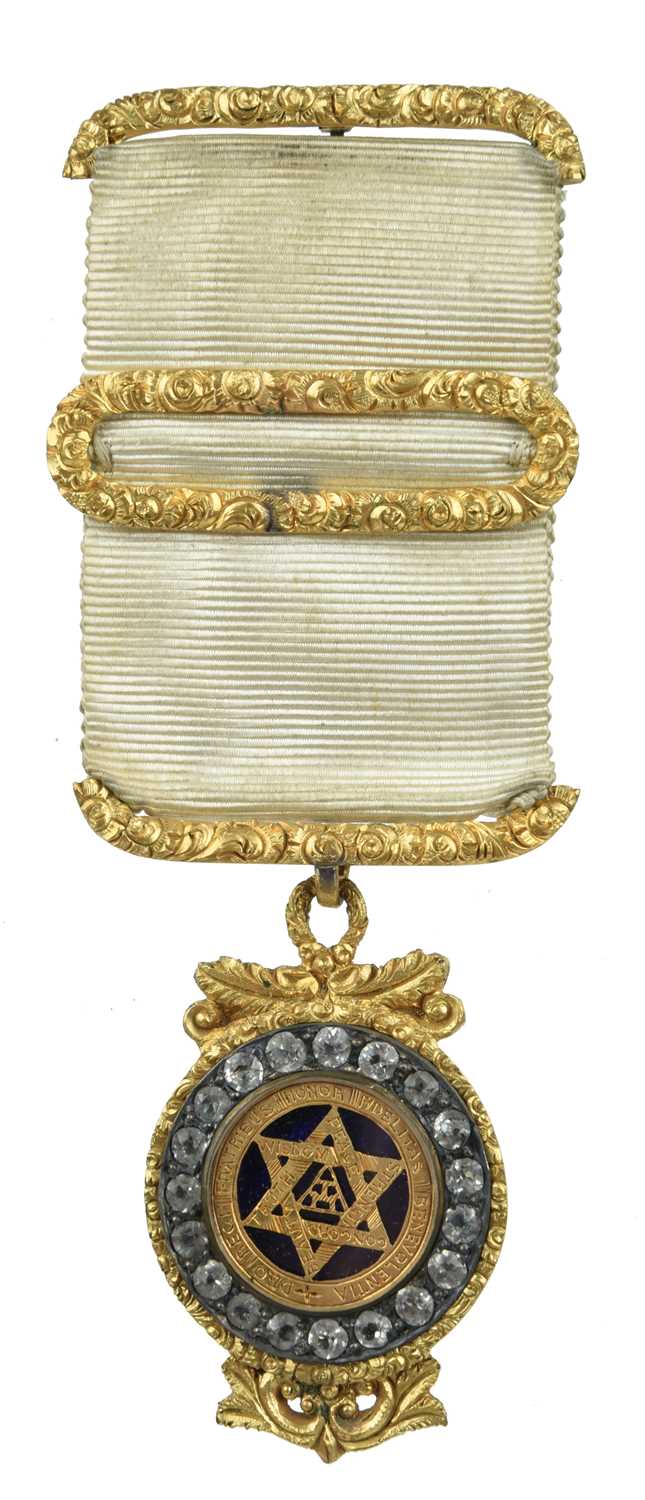 Freemasonry: a Victorian gilt, enamelled and paste set masonic jewel, triple tau within a