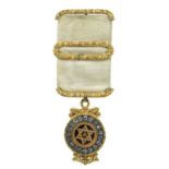 Freemasonry: a Victorian gilt, enamelled and paste set masonic jewel, triple tau within a