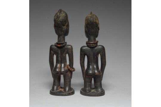 A pair of Yoruba male Ibeji figures Nigeria with glass bead bands, 26cm high. (2) Provenance Zbyszek - Image 3 of 4