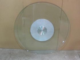 Three large good quality contemporary tempered glass lazy Susan's with speckled coated metal bases