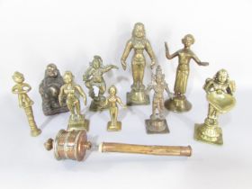 A collection of eight various brass Indian Hindu deities and temple figures, a Buddha, and a small