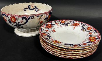 Late 19th century Junket bowl with six matching plates all decorated with a floral detail