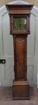 A Georgian country oak long case clock, enclosing a square brass 10” dial marked Jas. Webster,
