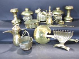 A mixed selection of brass ware, including Middle Eastern coffee pots on stands, incense burners,