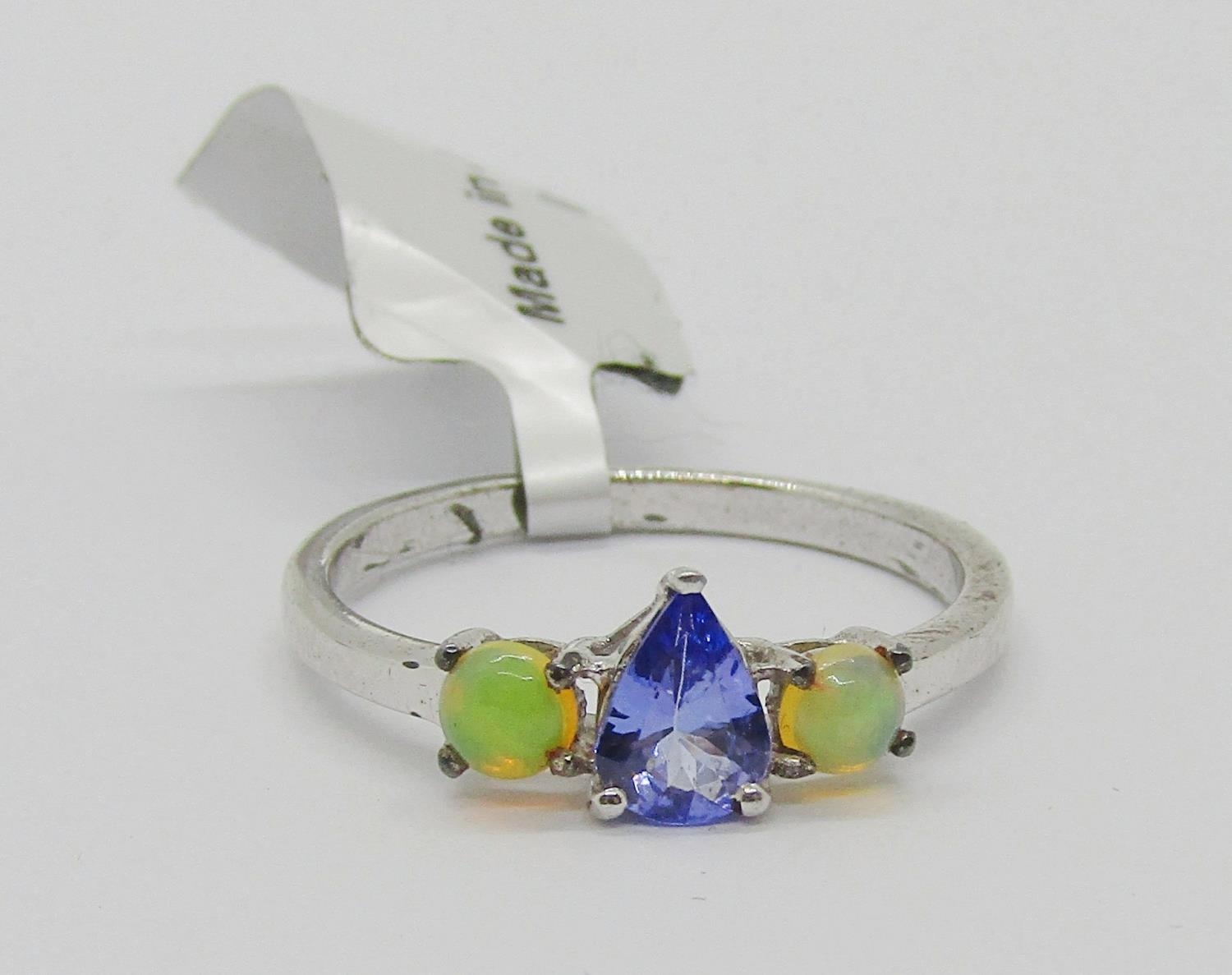 Collection of purple - violet gem set silver dress rings, to include amethyst, tanzanite, opal, - Image 3 of 4