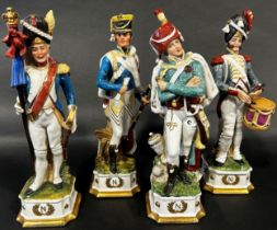 Fourteen Capodimonte porcelain figures of Napoleonic soldiers, to include Napoleon