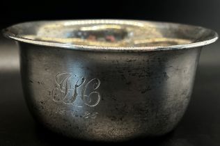 A silver christening bowl, initialled 'J H', dated '18.1.25', Birmingham 1924, maker George Unite, 4