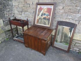 A Arts and Crafts oak coal/log box overlaid with copper fittings together with a oak stick stand,