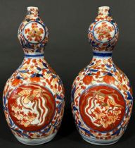 Pair of 19th century gourd shaped Imari vases with traditional floral detail