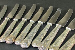 Twelve 19th century silver teaspoons and twelve shell patterned dinner knives, teaspoons 7.4oz