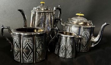 A four piece silver plated tea service, a silver plated water jug, together with a cake stand, a