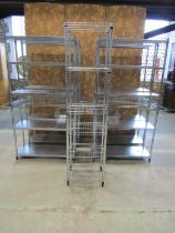 Four Ikea Omar freestanding sectional shelving units with additional side baskets. 179 cm high x