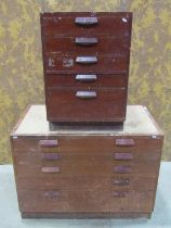 A vintage chest of five long drawers set on a slightly recessed plinth, 76 cm high x 104 cm wide x