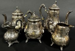 A four piece French silver plate tea and coffee service, a single cream jug and a circular drinks