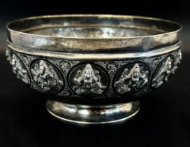 An Indian silver metal bowl, with squatting deities to the bowl, Tarachuno Parshad Jeweller Bombay