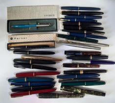 A large collection of vintage Parker fountain pens, to include duofold examples, junior examples,