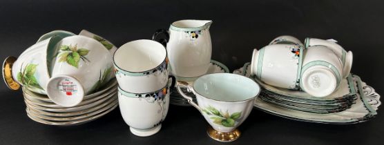 Four Paragon Rose pattern cups and saucers in the Virgo pattern, a Japanese tea service with