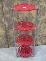 A good quality contemporary polished and painted steel four tier floor standing saucepan stand