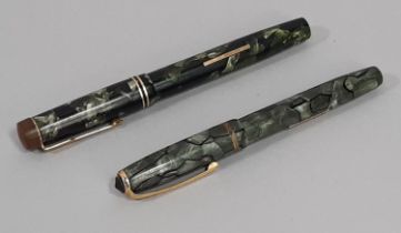 Two vintage fountain pens; a Stephens Leverfil no 270 with 14ct nib together with a Burnham no 51