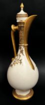 Royal Worcester oviform ewer, the matt white body overlaid in gilt, with shaped handle and spout,