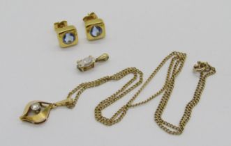 Group of modern yellow metal gem set jewellery comprising a stylised pendant necklace set with a