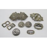 Collection of antique silver buckles and buttons, to include a late Victorian button depicting a