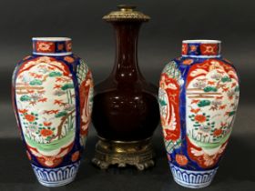 Pair of Imari vases of oviform, further sang de boeuf vase with applied gilded base and cover