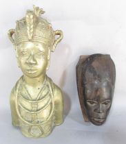 A polished bronze “Benin” type bust of an African Warrior, 30cm high, and a wood carving of a