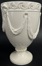 A Wedgwood 19th century creamware goblet shaped vase with mask and scrolling detail