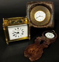 Early 20th century travelling clock in engraved circular case and Morocco leather case, with