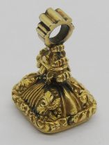 19th century yellow metal intaglio-cut citrine seal fob, probably depicting Shakespeare, 2.5cm H