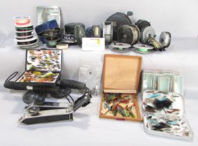A mixed selection of fishing equipment including five Hardy fishing reels, numerous other types of