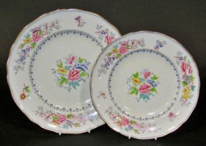 Quantity of 19th century floral dinner plates with blue and gilded band, comprising dinner and