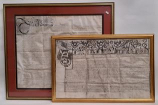 Two 17th century indenture manuscripts, hand written with ornately decorated headings, ink on