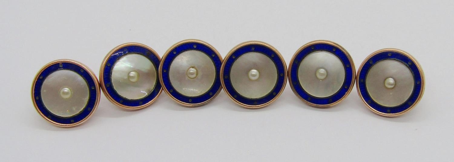 Set of six early 20th century 9ct mother of pearl dress buttons with cobalt blue enamel borders, 8.