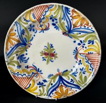 A continental Faience glazed charger