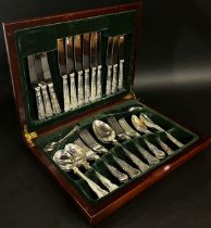 A mahogany canteen containing good quality King’s pattern silver plated cutlery, complete for six