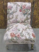Low Dutch nursing chair on turned supports