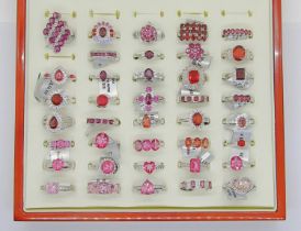 Collection of red - pink gem set silver dress rings, to include ruby, pink sapphire, garnet,