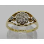 Early 20th century 18ct diamond daisy cluster ring, maker 'W.L', size O/P, 3.1g