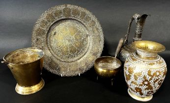 A small collection of Middle Eastern brass ware, including a vase, a ewer, a small pail, a three