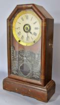 Two American mantle clocks by the Ansonia Company and Seth Thomas, one with gingerbread casework