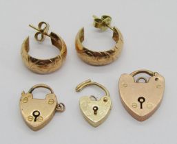 Group of 9ct jewellery comprising three padlock clasps (all af) and a pair of hoop stud earrings, 6g