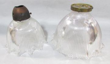 Two ribbed and crimped glass light shades.