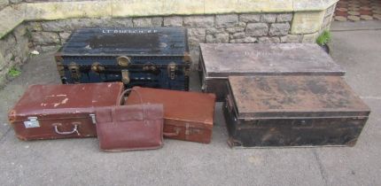 A vintage fibre and overlaid cabin trunk with stitched leather carrying handles together with two